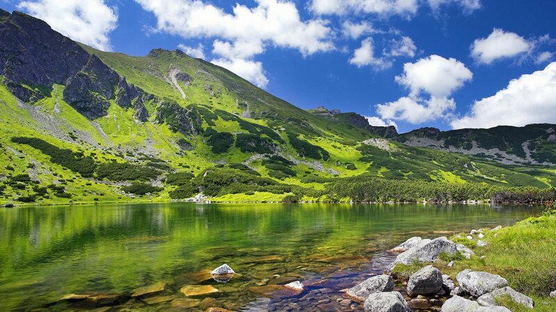 Mountain lake with green hills
