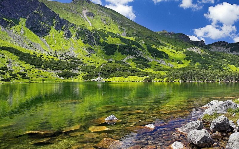 Mountain lake with green hills