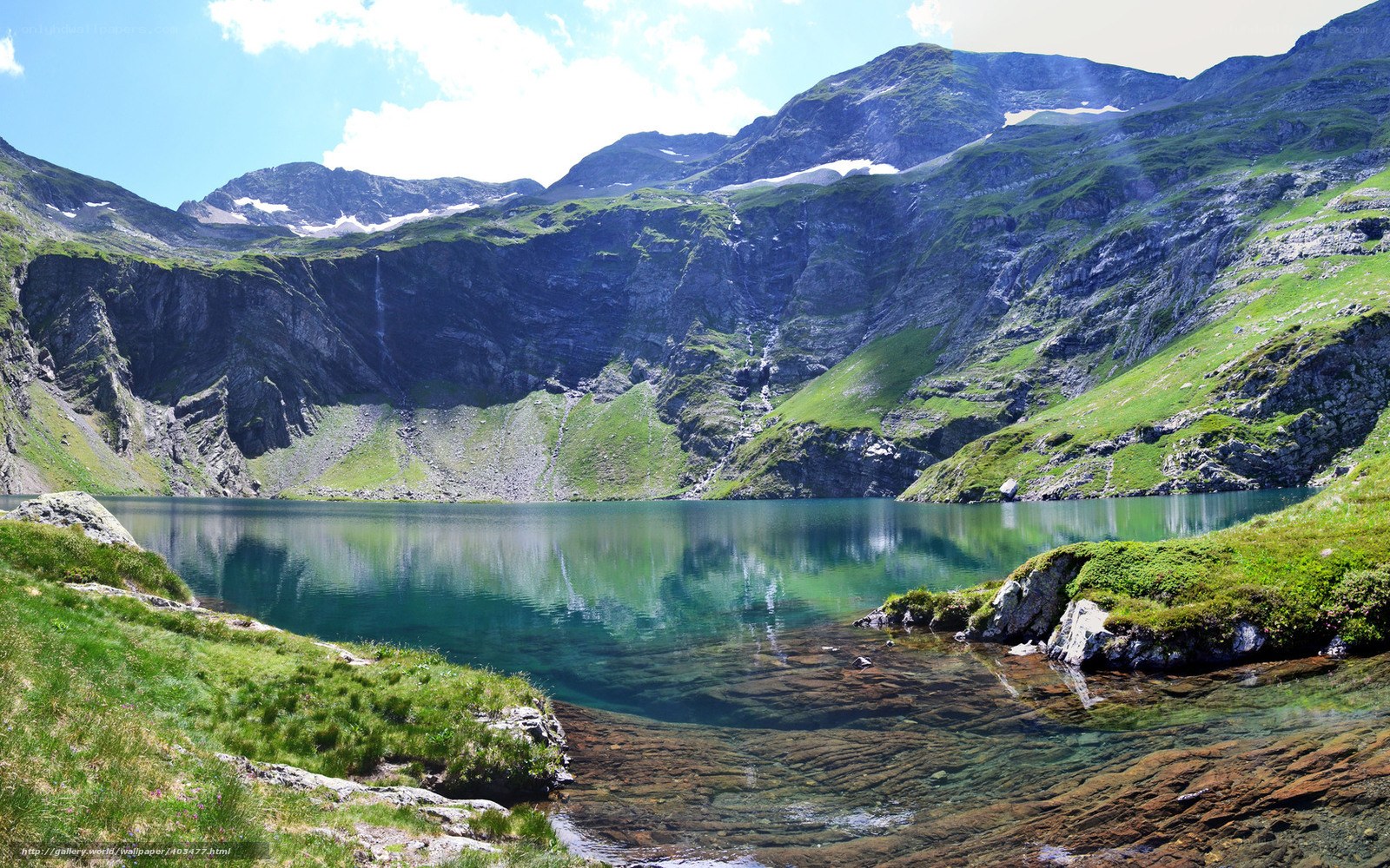 Mountain lake with green hills