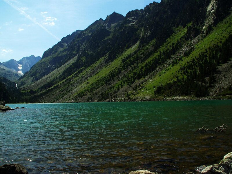 Mountain lake with green waters