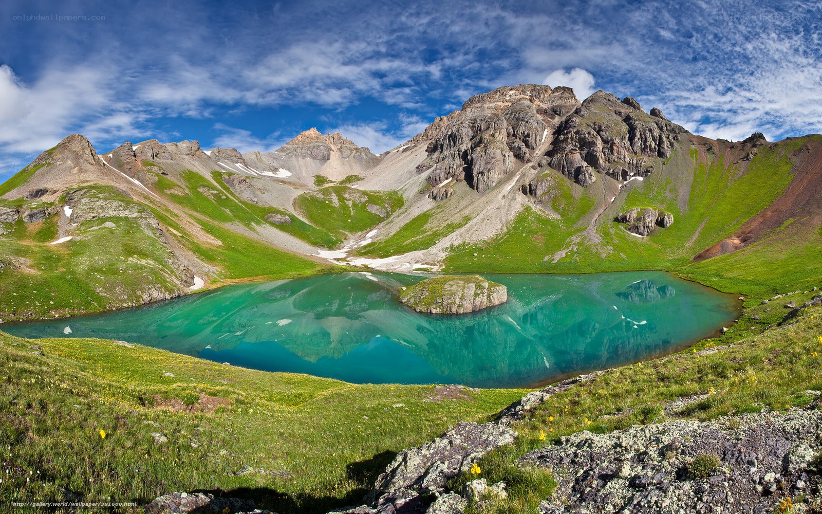 Mountain lake with green waters