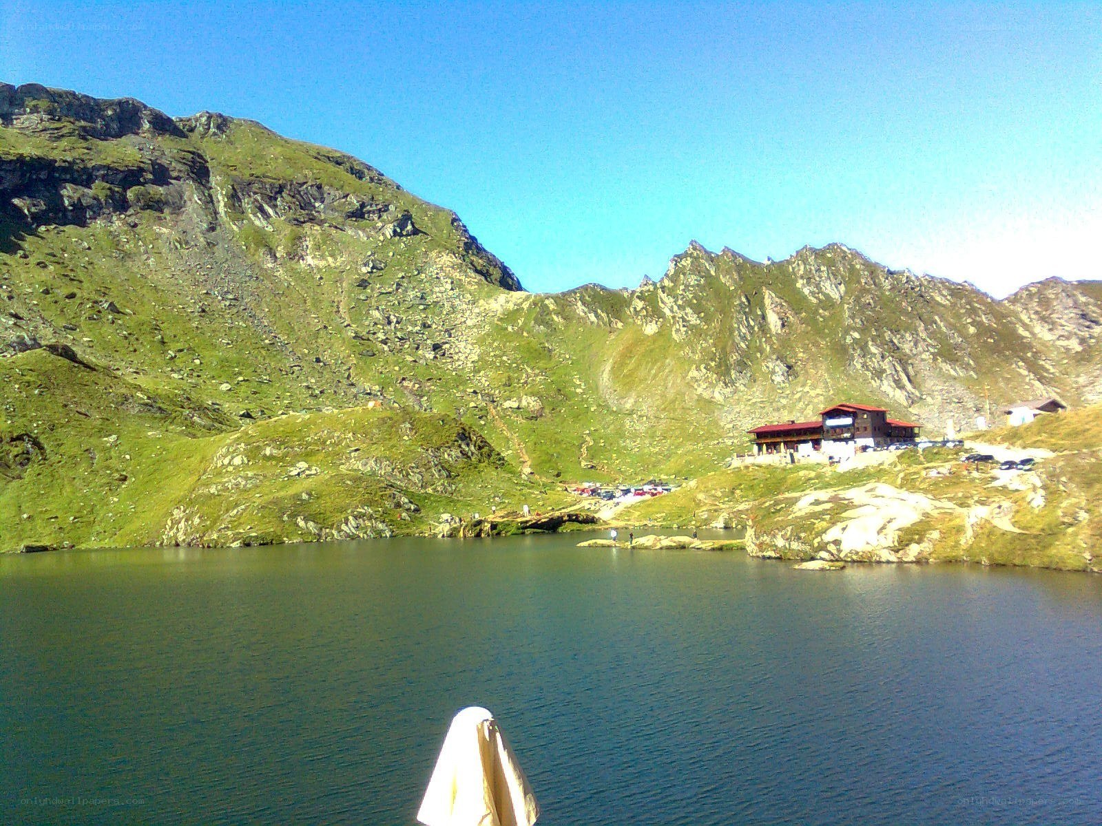 mountain lake with lodge