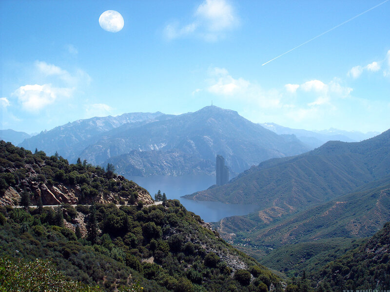 Mountain lake with moon and tower