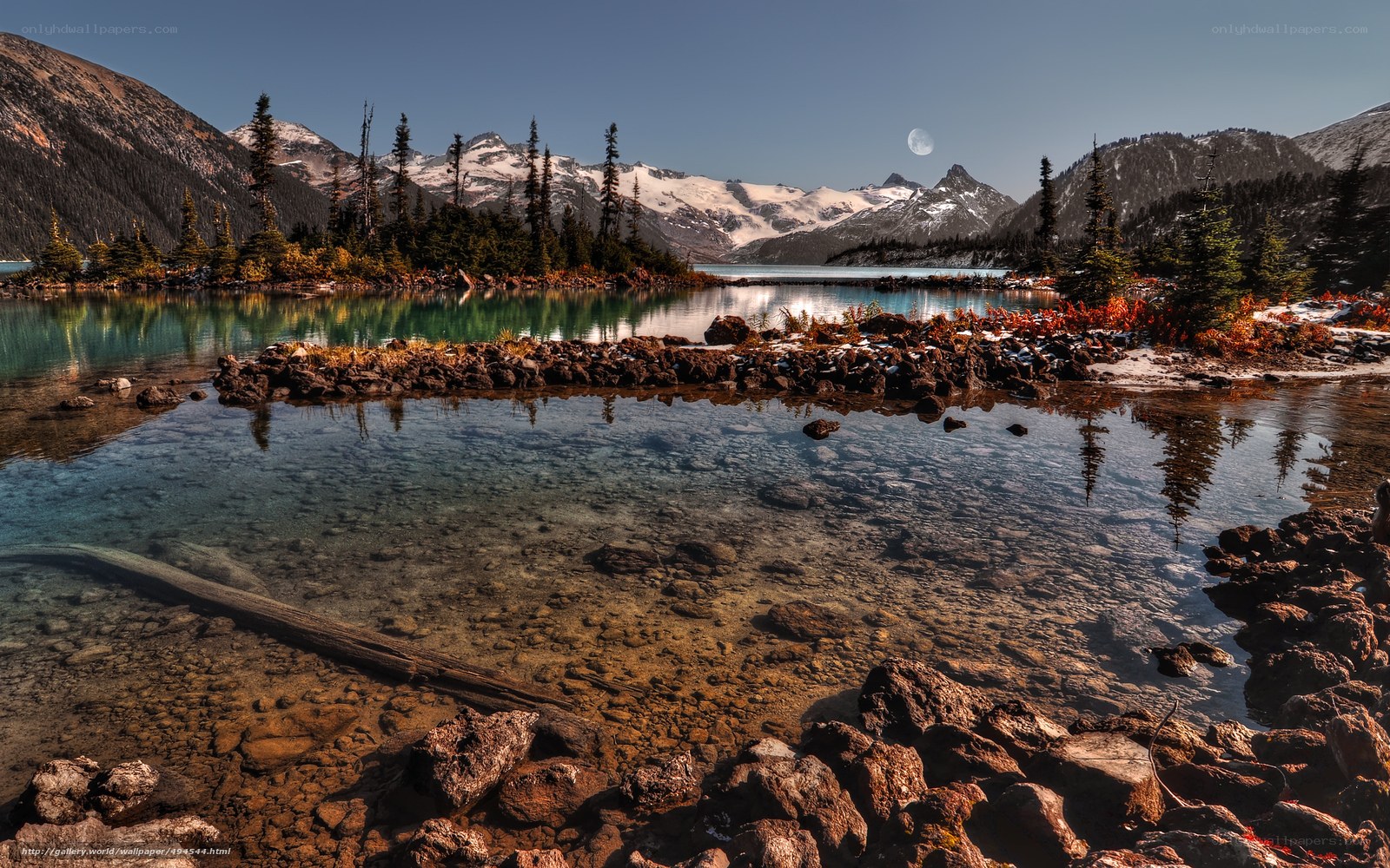 Mountain lake with moonrise