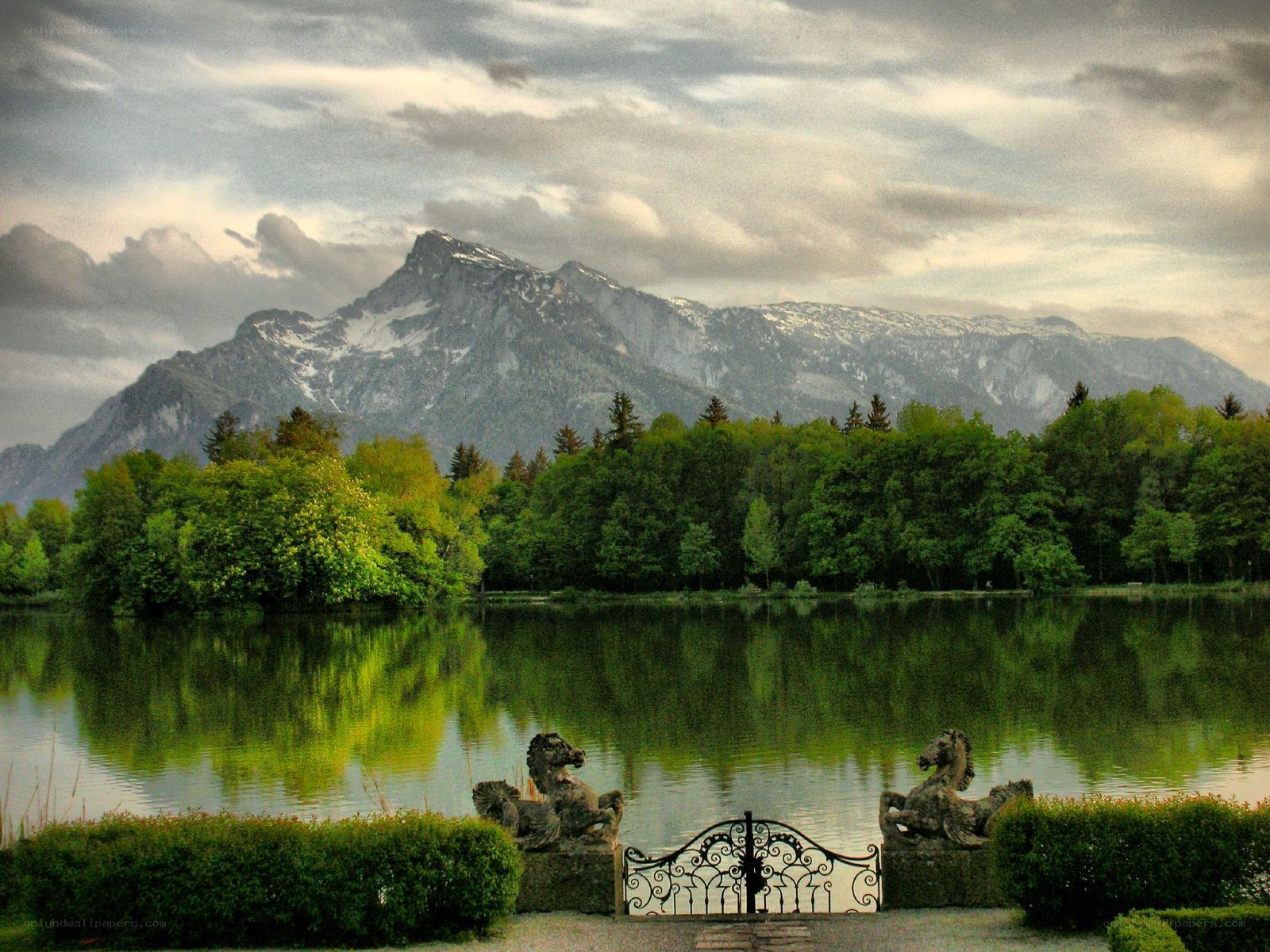 Mountain lake with ornate gate