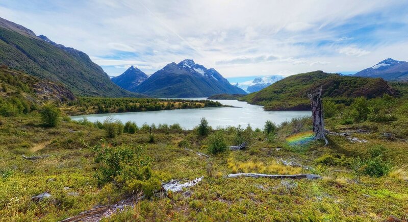 Mountain lake with rainbow