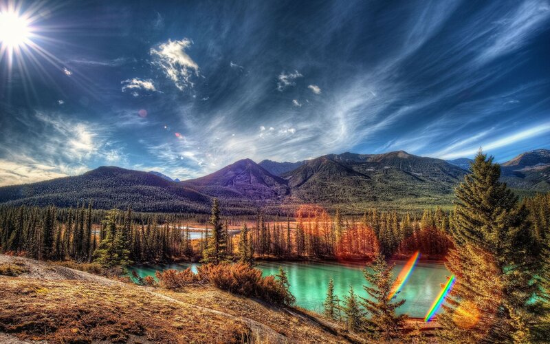 Mountain lake with rainbow