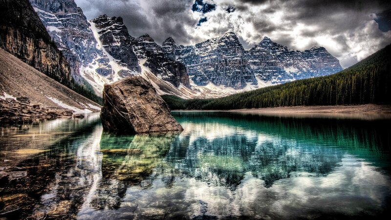 Mountain lake with rock reflection