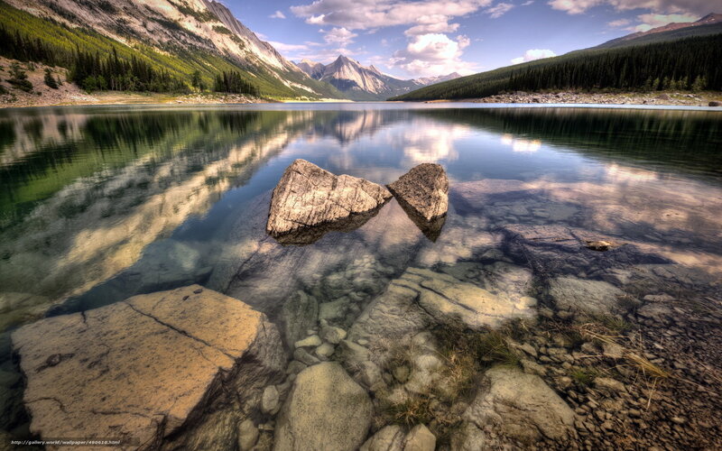 Mountain lake with rock reflection