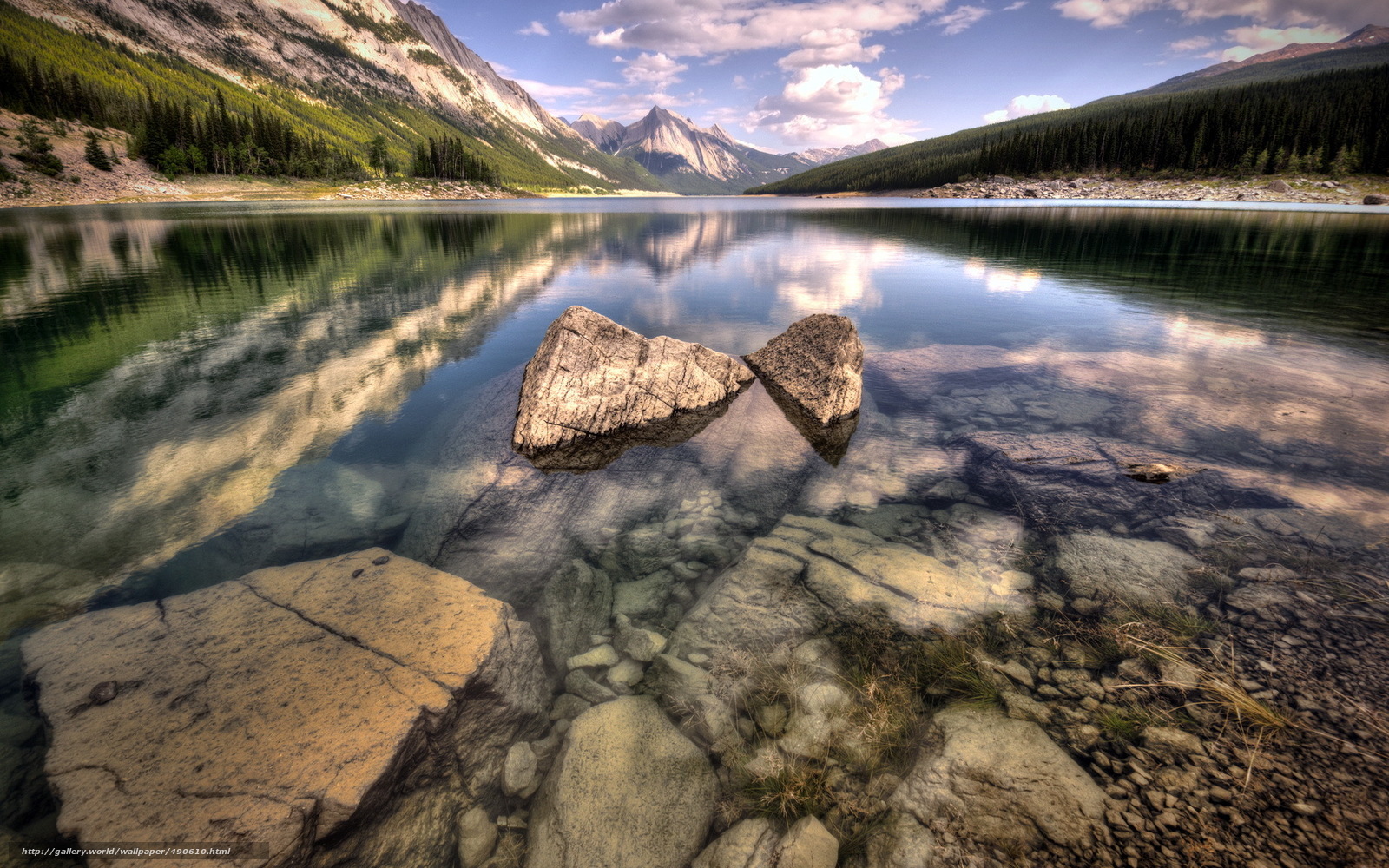 Mountain lake with rock reflection