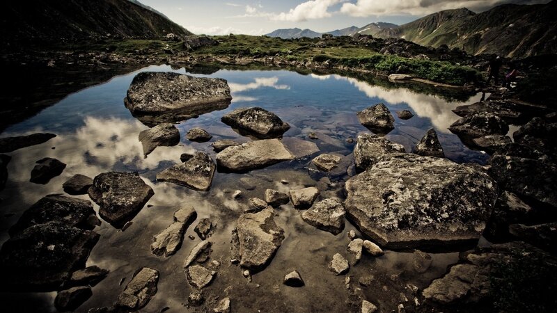 Mountain Lake with Rocks — Blue, Serene, Afternoon, Photograph, Clouds, Mountains