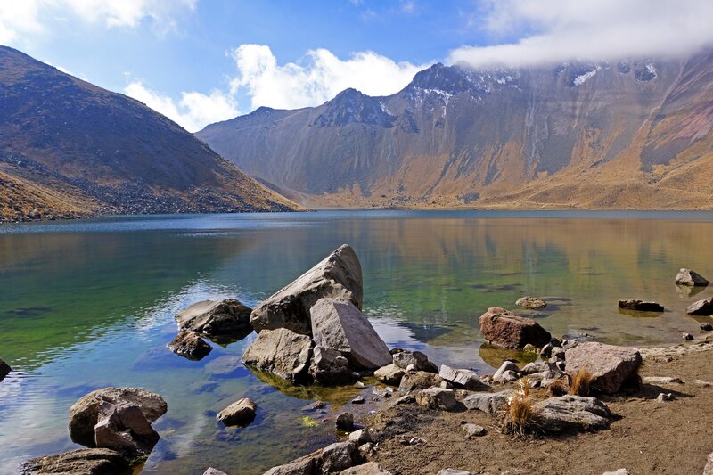 Mountain Lake with Rocks — Blue, Serene, Afternoon, Photograph, Mountains, Clouds