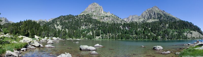 Mountain Lake with Rocks — Blue, Serene, Afternoon, Photograph, Mountains, Trees, Sky