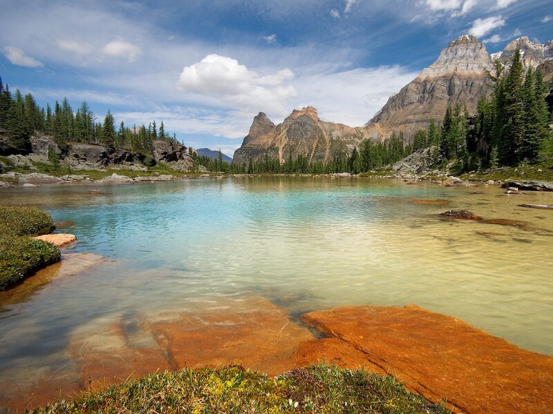 Mountain Lake with Rocks — Blue, Serene, Afternoon, Photograph, Mountains, Trees