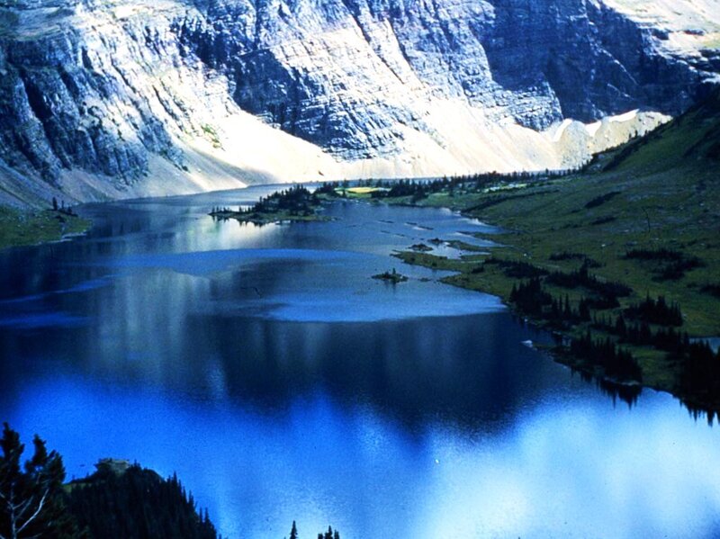 Mountain lake with rocky cliffs