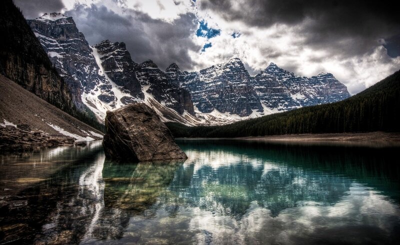 Mountain lake with rocky outcrop