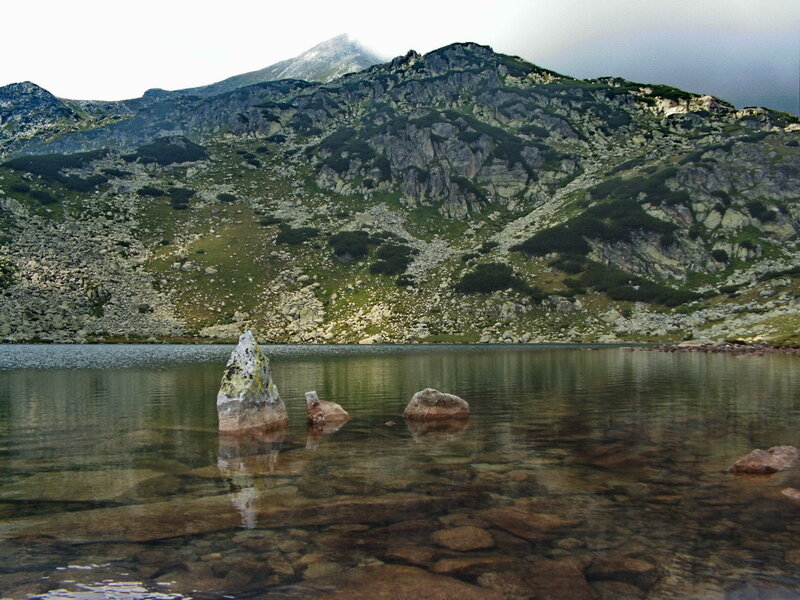 Mountain lake with rocky outcrops