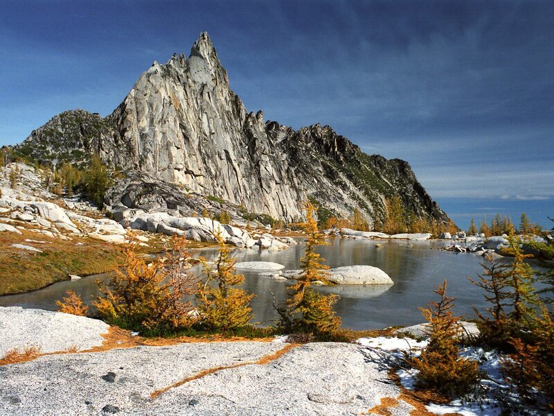 Mountain lake with rocky peak