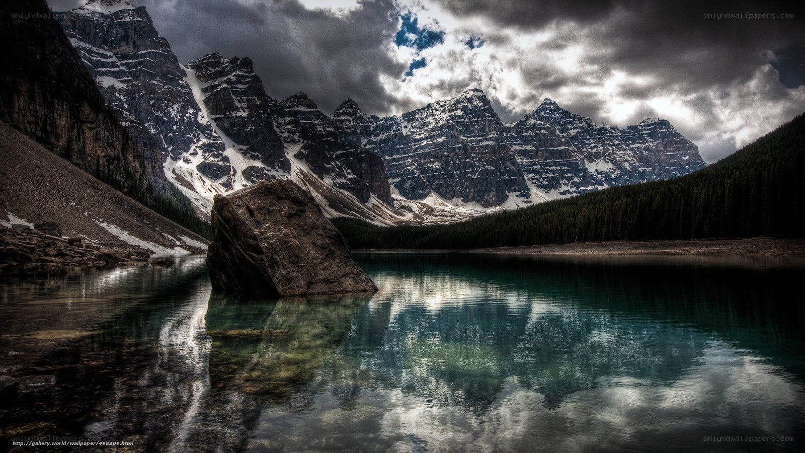 Mountain lake with rocky peak