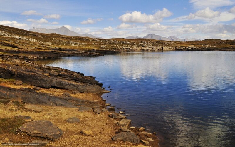 Mountain lake with rocky shore