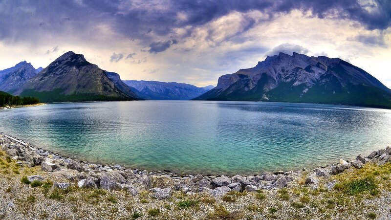 Mountain lake with rocky shore