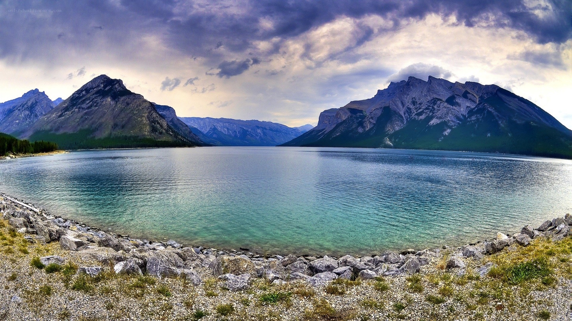 Mountain lake with rocky shore