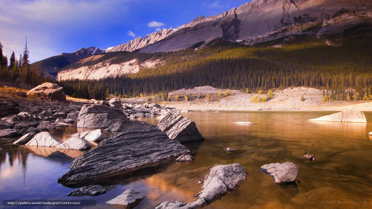 Mountain lake with rocky shore