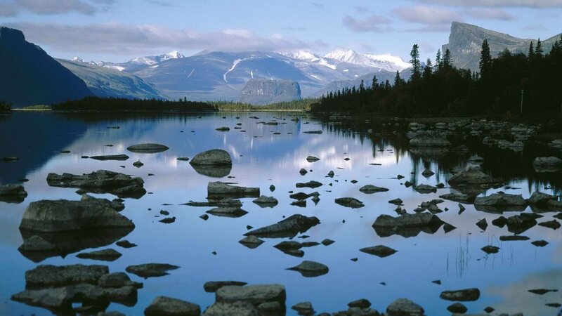 Mountain lake with rocky shore