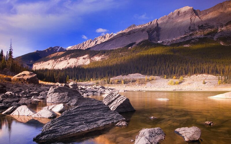 Mountain lake with rocky shore