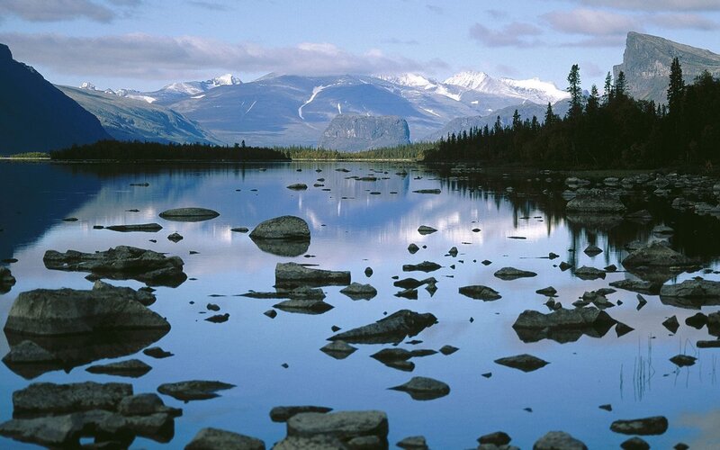 Mountain lake with rocky shore