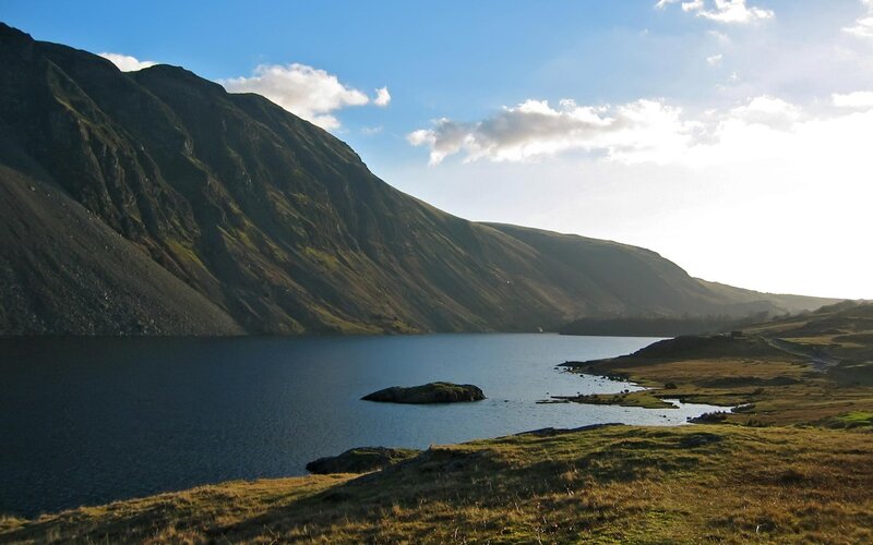 Mountain lake with rocky shore