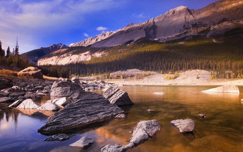 Mountain lake with rocky shore