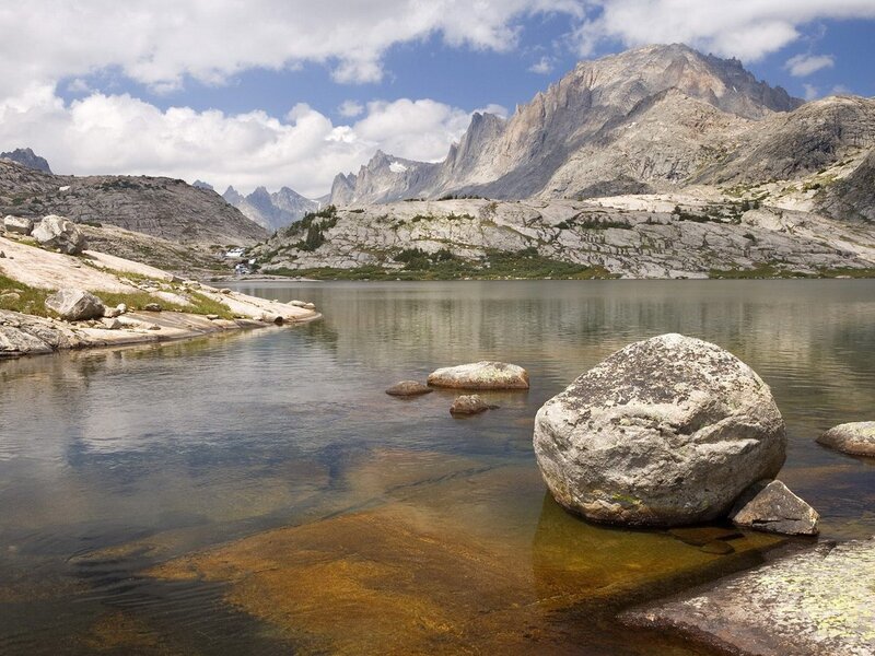 Mountain lake with rocky shore