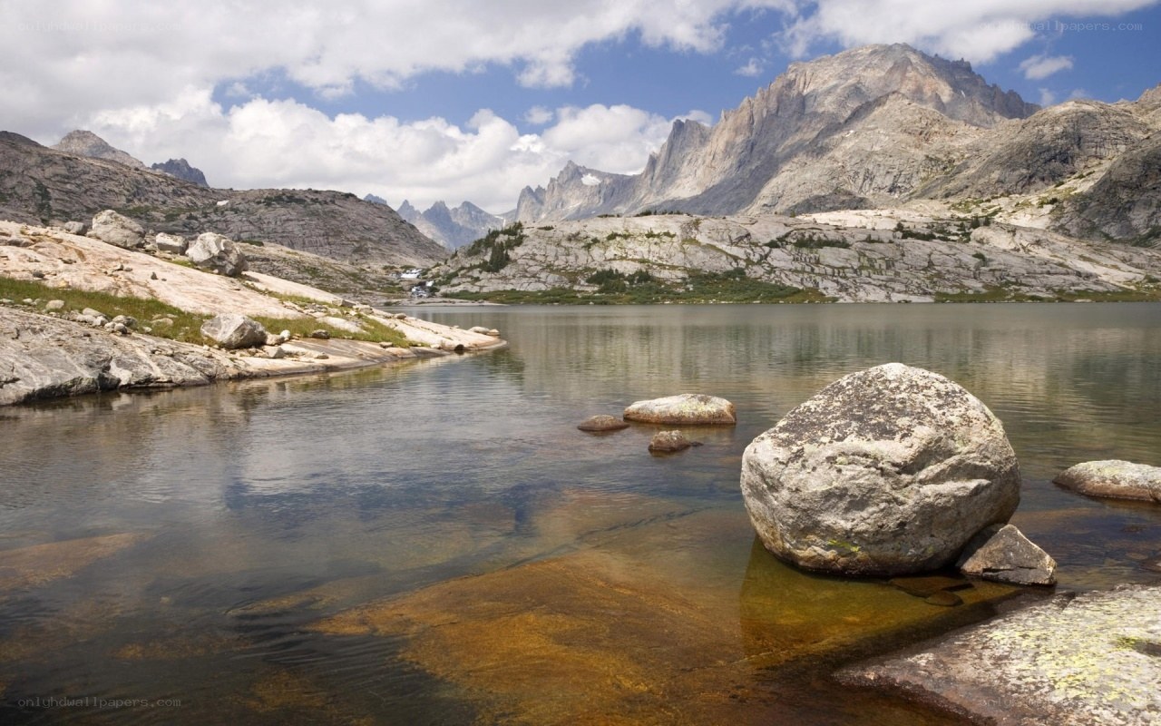 Mountain lake with rocky shore