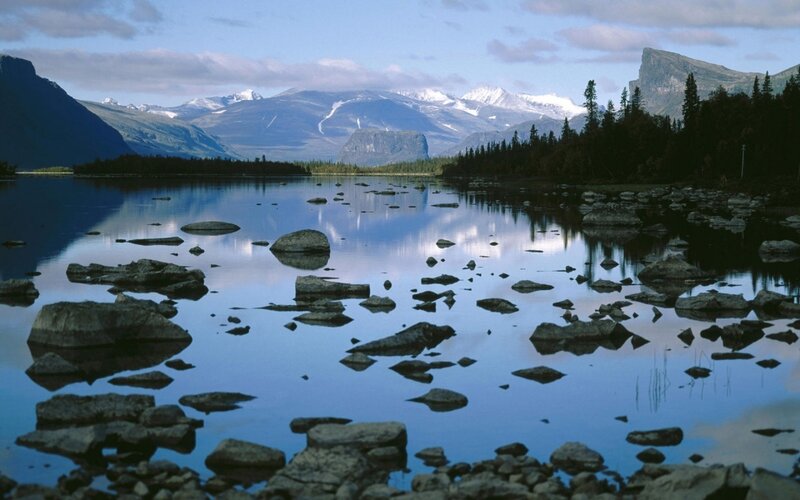 Mountain lake with rocky shore