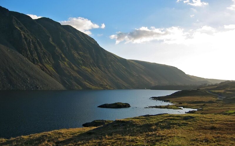 Mountain lake with rocky shore