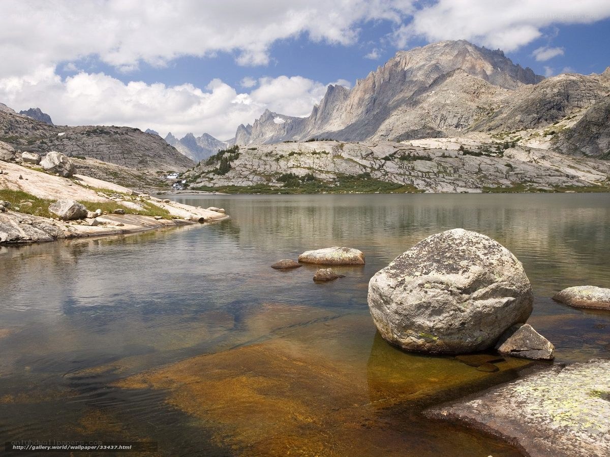 Mountain lake with rocky shore