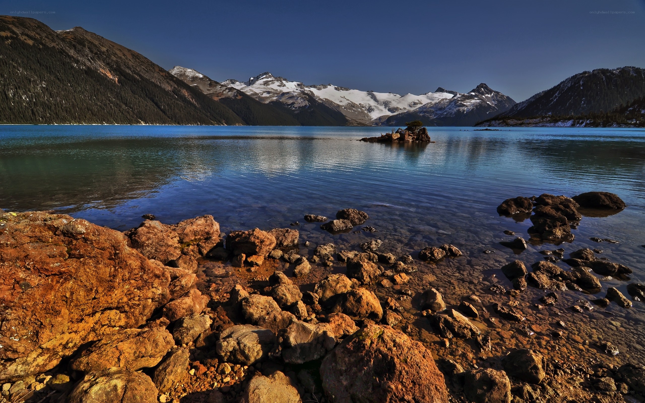 Mountain lake with snow-capped peaks