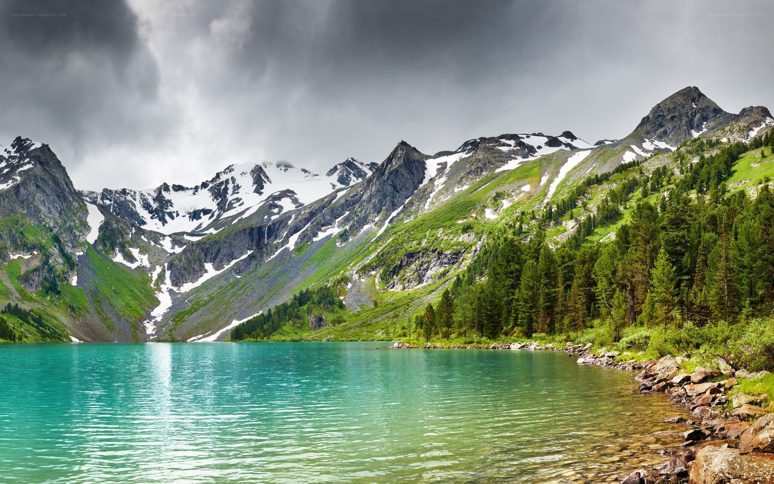 Mountain lake with snow-capped peaks