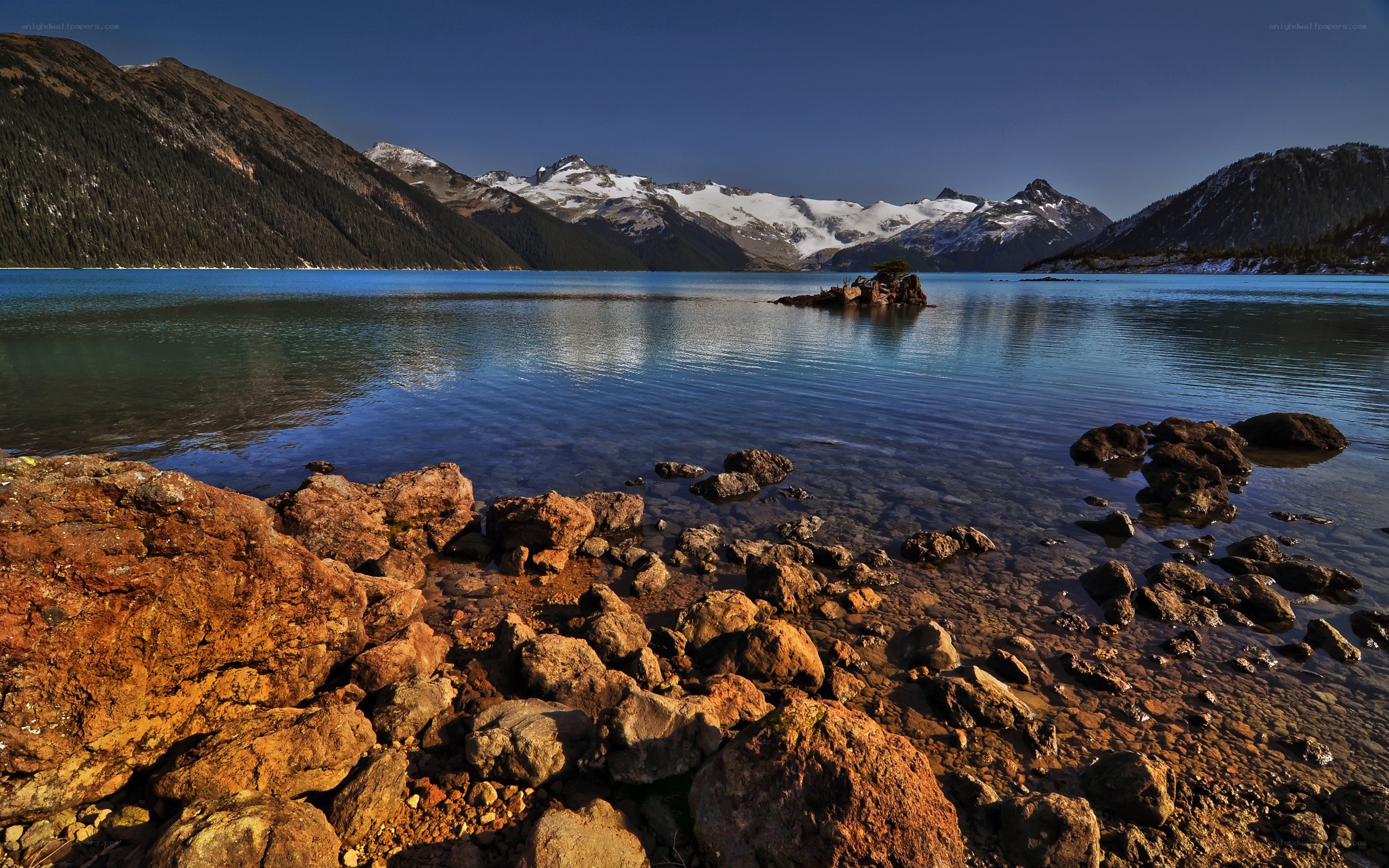 Mountain lake with snow-capped peaks