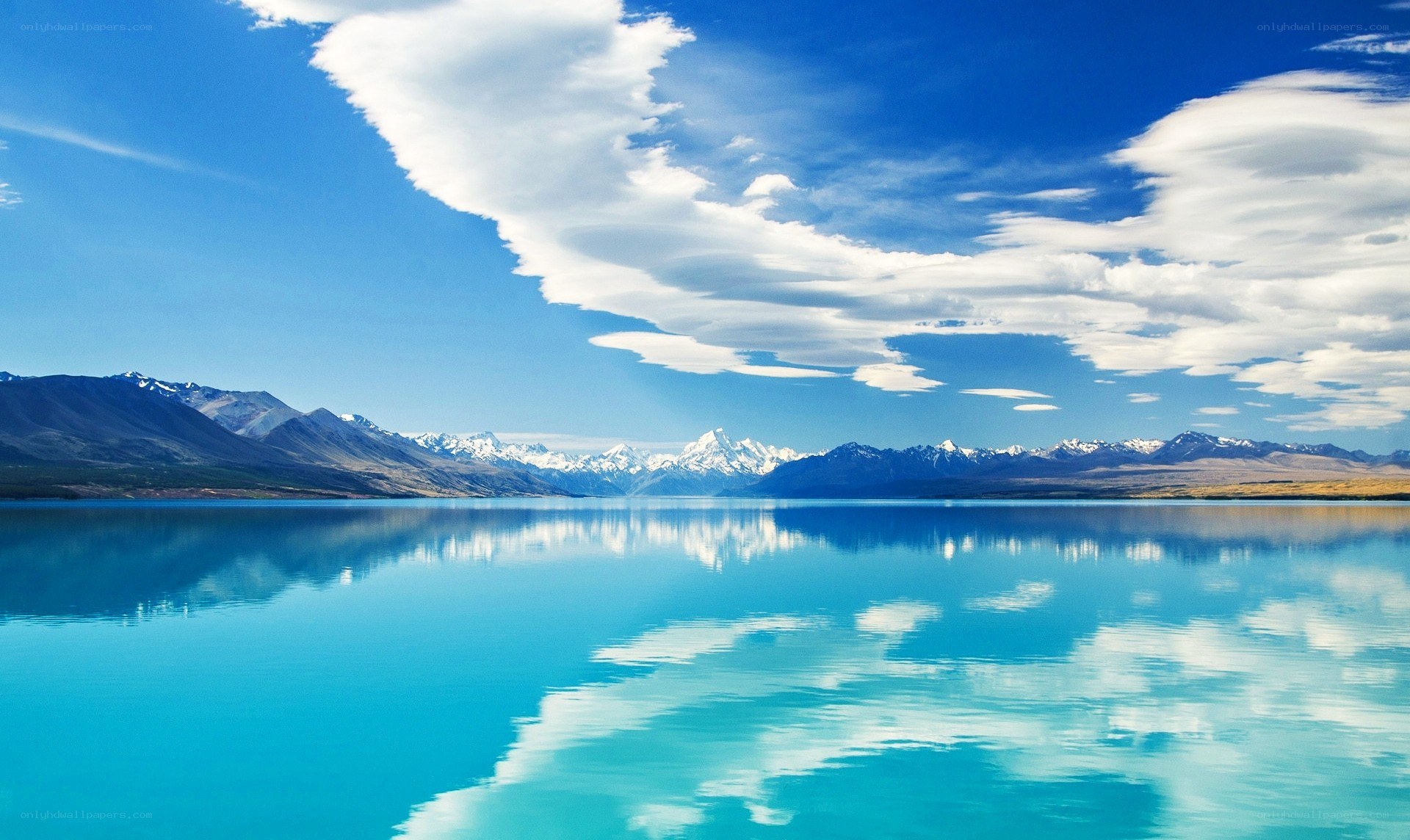 Mountain lake with snow-capped peaks