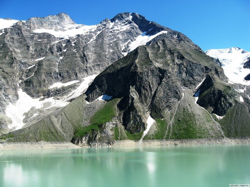Mountain lake with snow-capped peaks