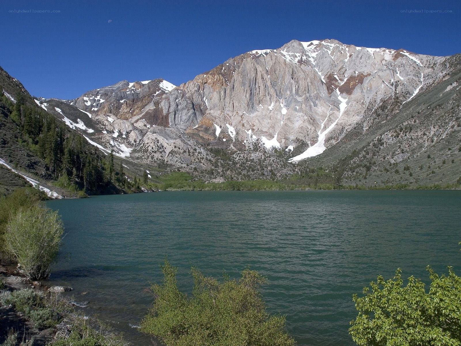 Mountain lake with snow-capped peaks