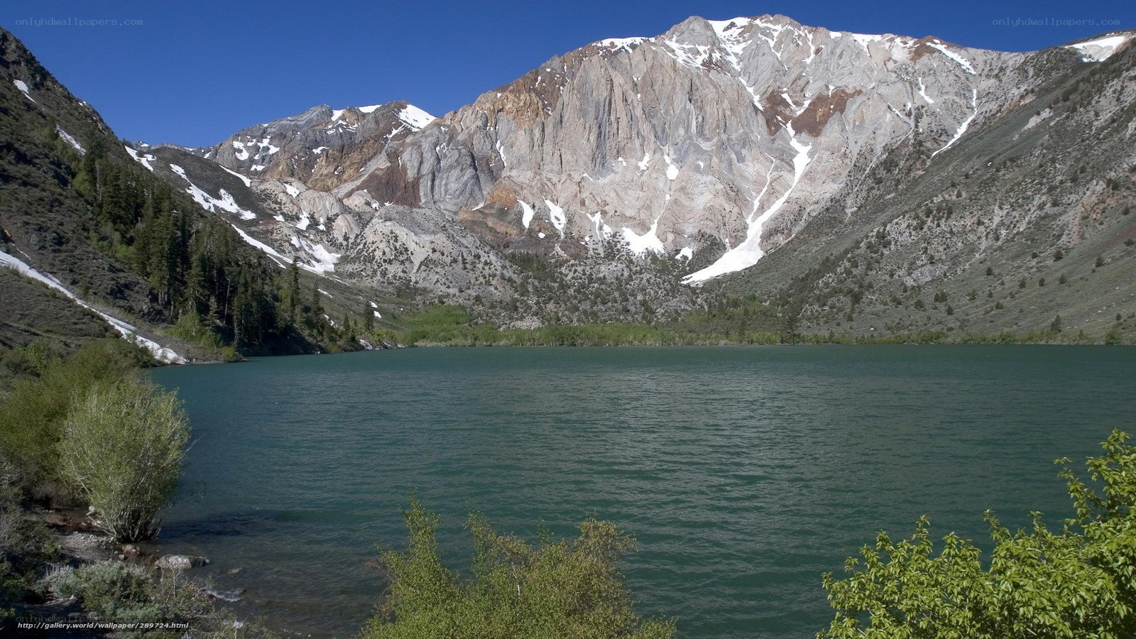 Mountain lake with snow-capped peaks