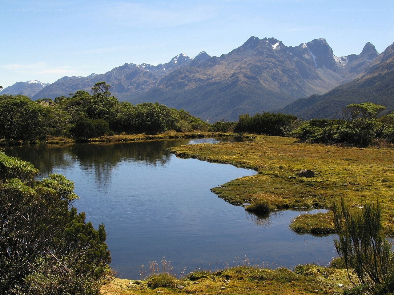 mountain lake with snow-capped peaks