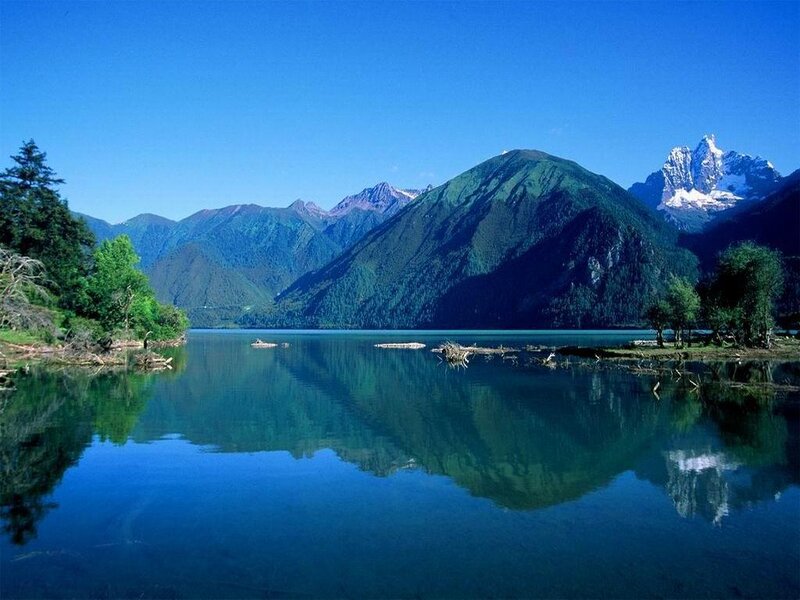 Mountain lake with snow-capped peaks