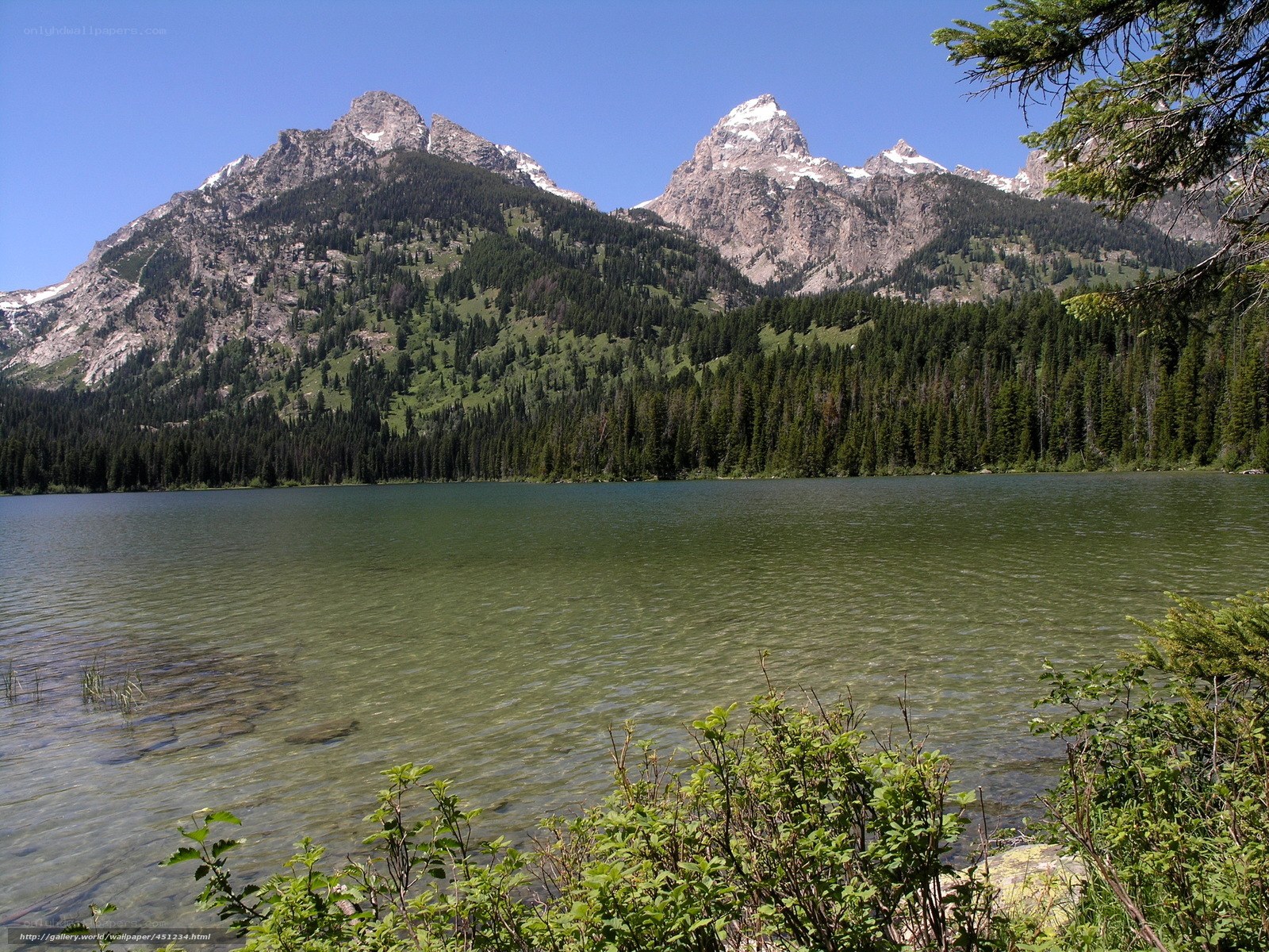 Mountain lake with snow-capped peaks