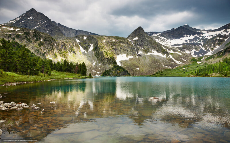 Mountain lake with snow-capped peaks