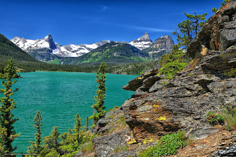 Mountain lake with snow-capped peaks