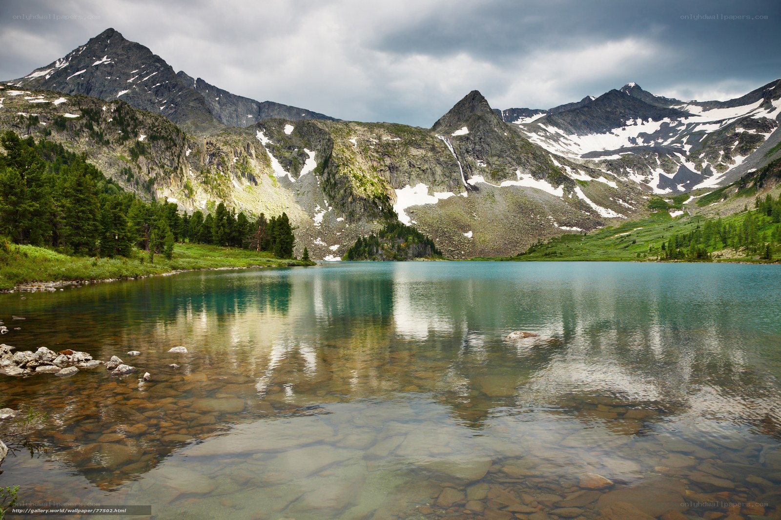 Mountain lake with snow-capped peaks